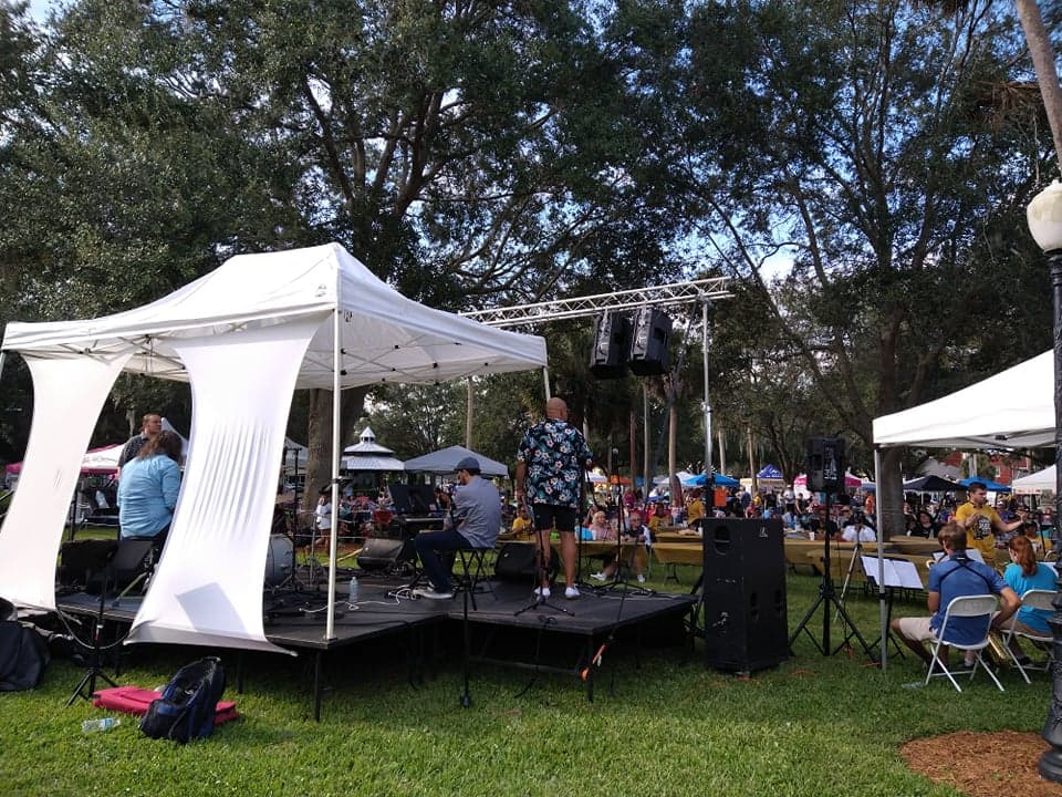 Outdoor stage setup with lighting and audio support